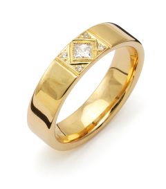 Vigselring Flemming Uziel Signo B073 i 18 k guld med diamant.