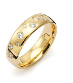 Vigselring Flemming Uziel Signo B034 i 18 k guld med diamant.