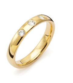 Vigselring Flemming Uziel Signo B035 i 18 k guld med diamant.