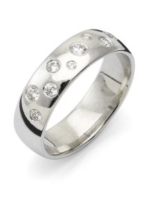 Vigselring Flemming Uziel Signo B041 i 18 k guld med diamanter.