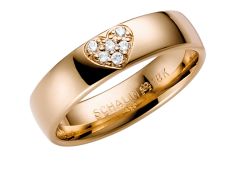 Vigselring Schalins Stjärnfall, Nova med 0,06 ct. diamant i 18 k guld.
